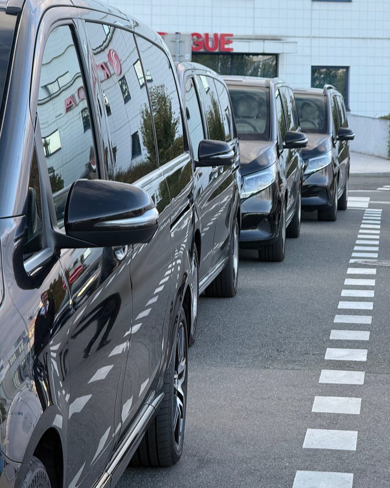 A line of Mercedes-Benz V-Class vans ready for an event
