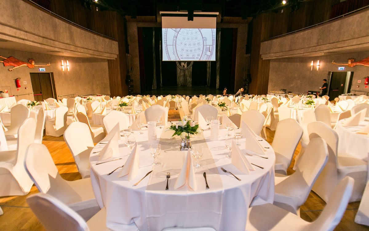 Elegant banquet hall prepared for a corporate gala dinner